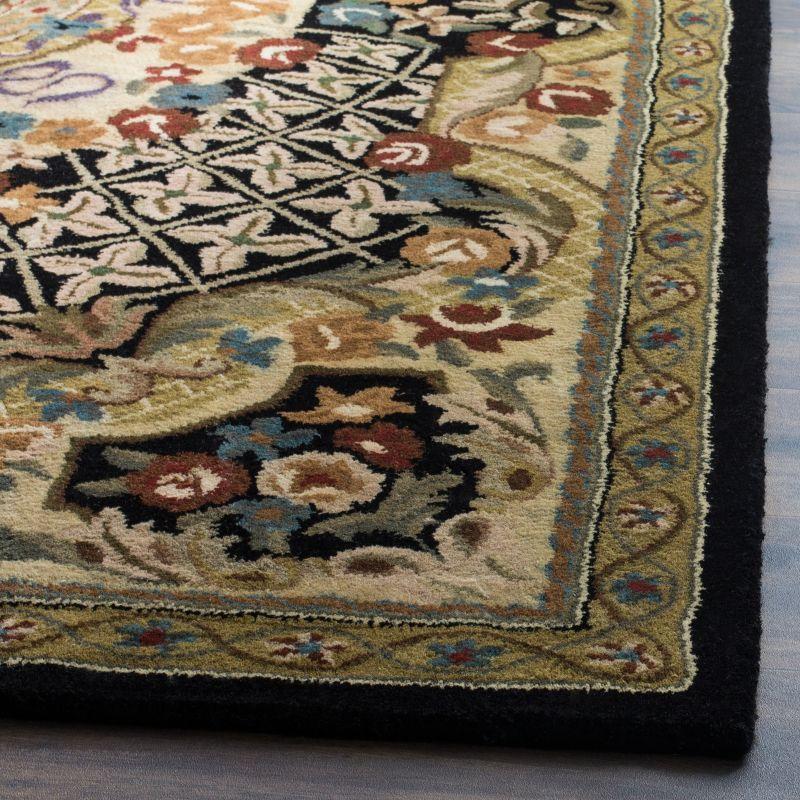 Classic CL304 Hand Tufted Area Rug - Black/Gold - 7'6"x9'6" - Safavieh.