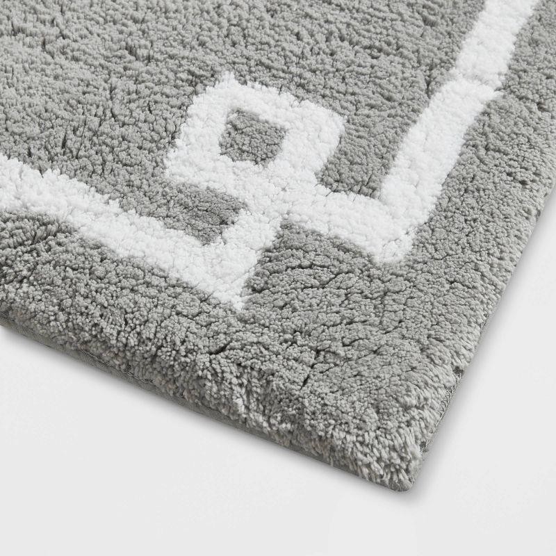 Evan 40" x 24" Gray Cotton Tufted Bath Rug