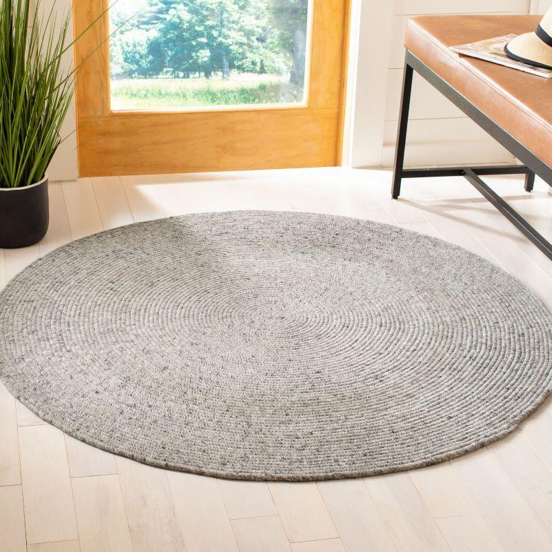 Handmade Light Gray Braided Wool Round Area Rug