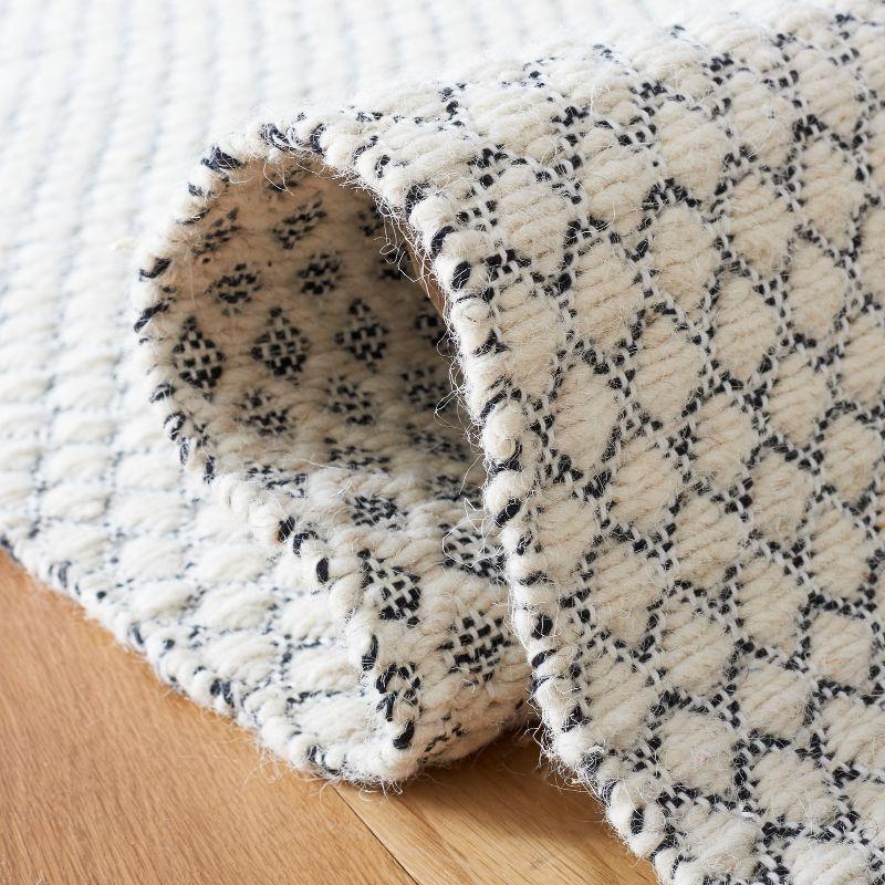 Montauk MTK813 Hand Woven Area Rug - Ivory/Black - 5'x8' - Safavieh.