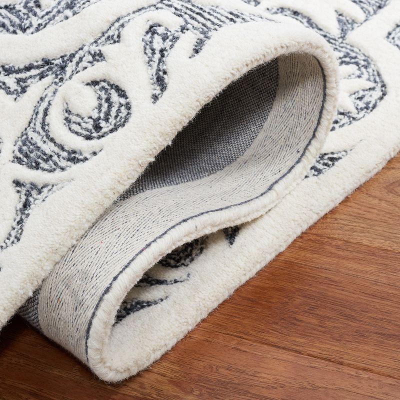 Metro MET859 Hand Tufted Indoor Area Rug - Black/Ivory - 6'x6' - Safavieh