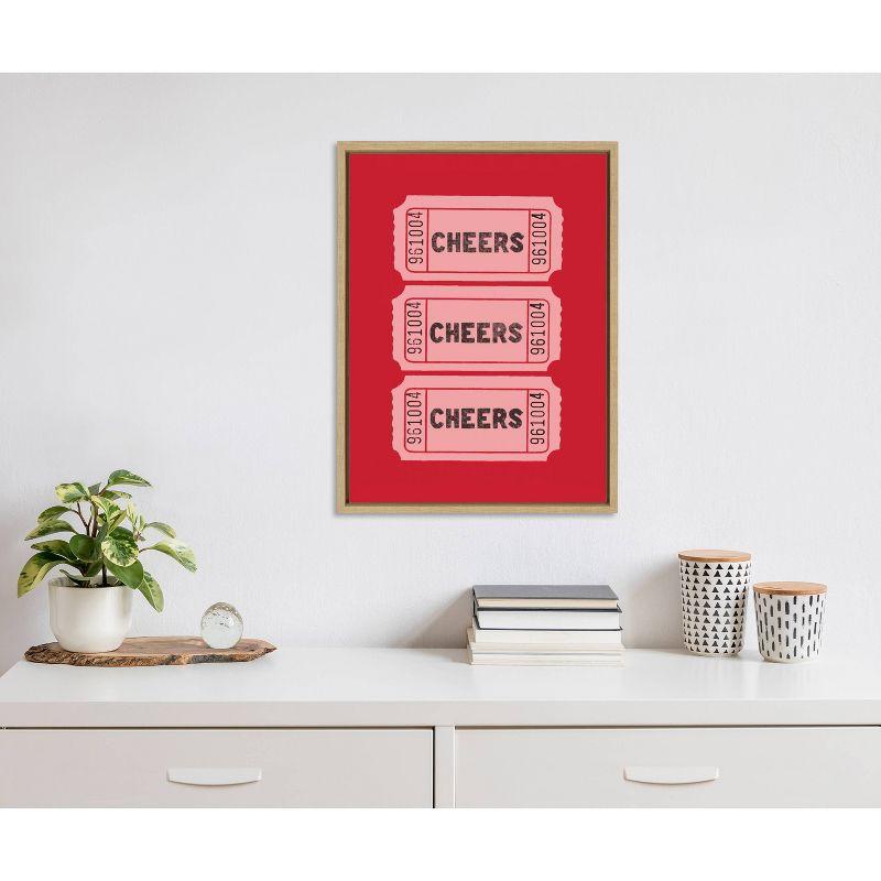 Kate & Laurel All Things Decor 18"x24" Cheers Pink Red Ticket Framed Canvas by Alli Standefer Natural