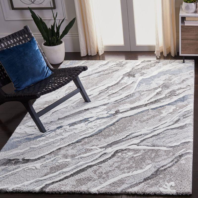 Century Blue and Gray Abstract Synthetic Area Rug 6'7" x 9'