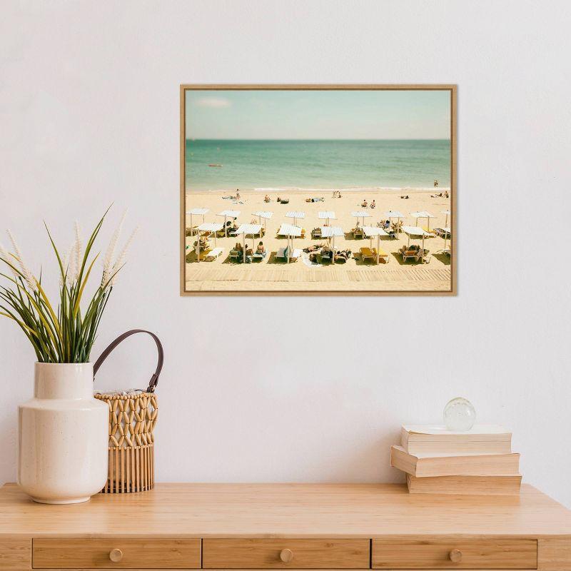 24" x 18" Seaside 3 by Carina Okula Framed Canvas Wall Art - Amanti Art: Beach Scene, Sunbathers, Coastal Decor