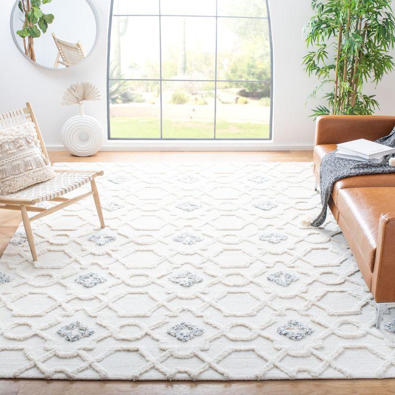 Ivory Hand-Tufted Wool Shag 8' x 10' Area Rug