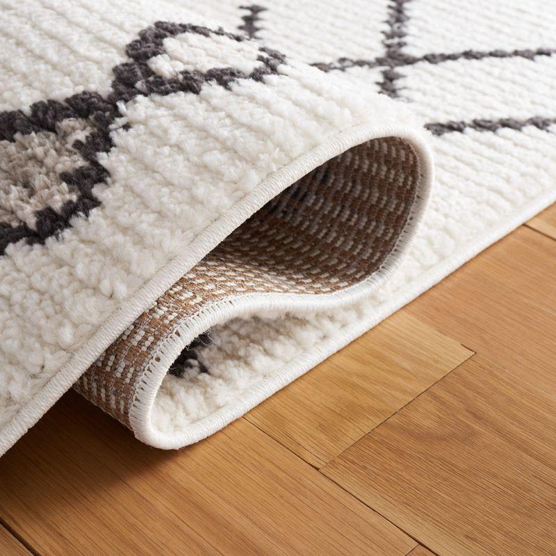 Ivory Moroccan Tassel 54'' Rectangular Synthetic Area Rug