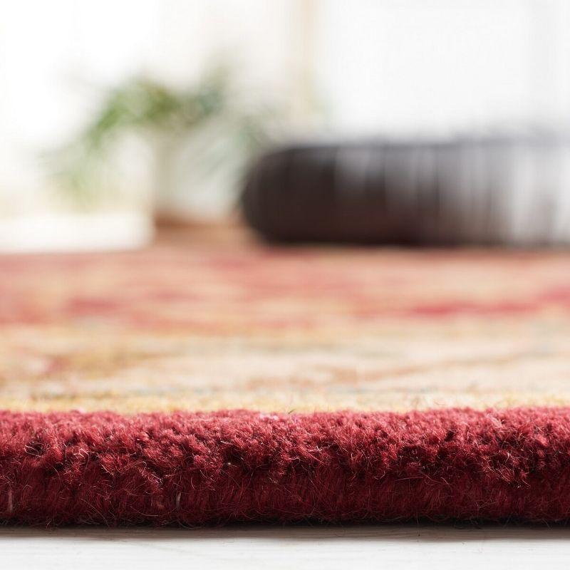 Heritage HG628 Hand Tufted Area Rug - Red/Ivory - 7'6"x9'6" Oval - Safavieh.