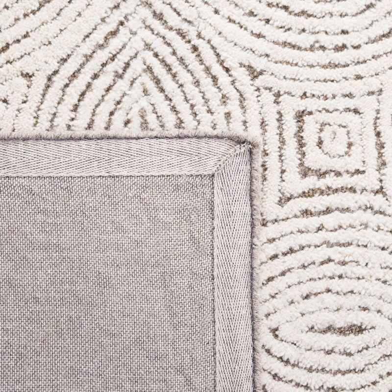 Ivory Abstract Handmade Wool 3' x 5' Tufted Area Rug