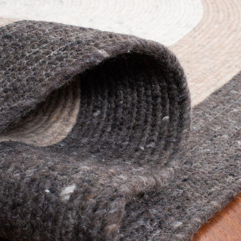 Braided BRD903 Hand Woven Indoor Area Rug - Charcoal/Ivory - 8'x10' Oval - Safavieh