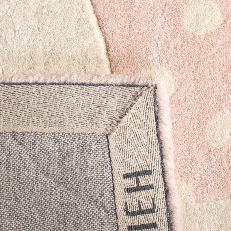 Safavieh Kids SFK922 Hand Tufted Area Rug - Pink/Ivory - 8'x10' - Safavieh.