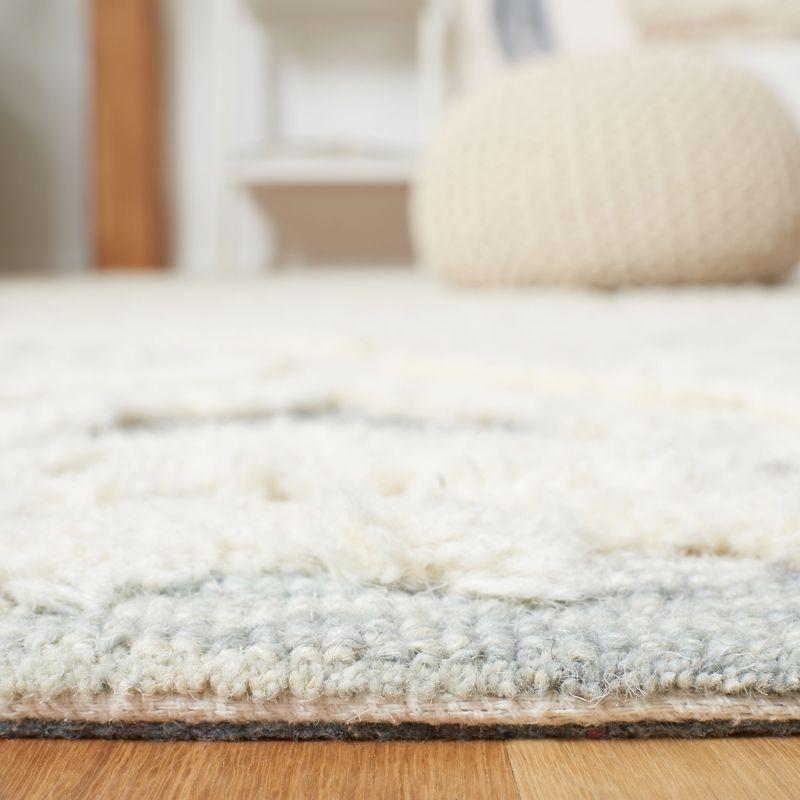 Metro MET111 Hand Tufted Indoor Area Rug - Ivory/Light Blue - 8'x10' - Safavieh