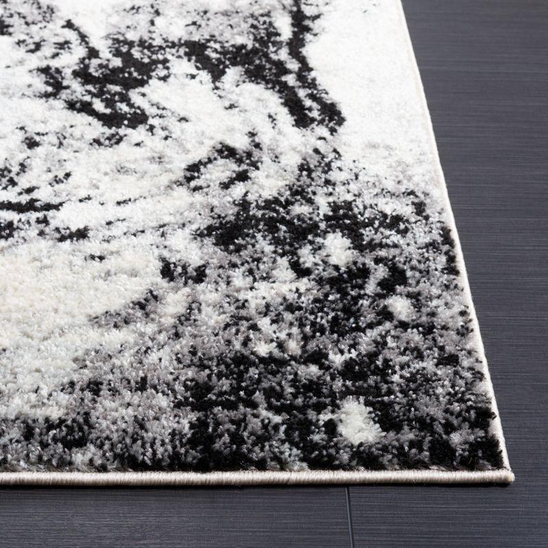 Ivory Abstract Hand-Knotted Soft Synthetic Area Rug