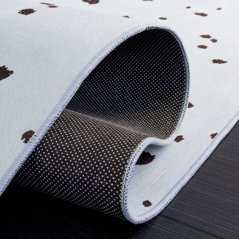 Faux Hide FAH502 Power Loomed Machine Washable Area Rug - Ivory/Black - 5'x8' - Safavieh.