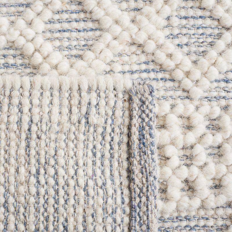 Ivory and Blue Hand-tufted Wool Cotton Blend 8' x 10' Area Rug