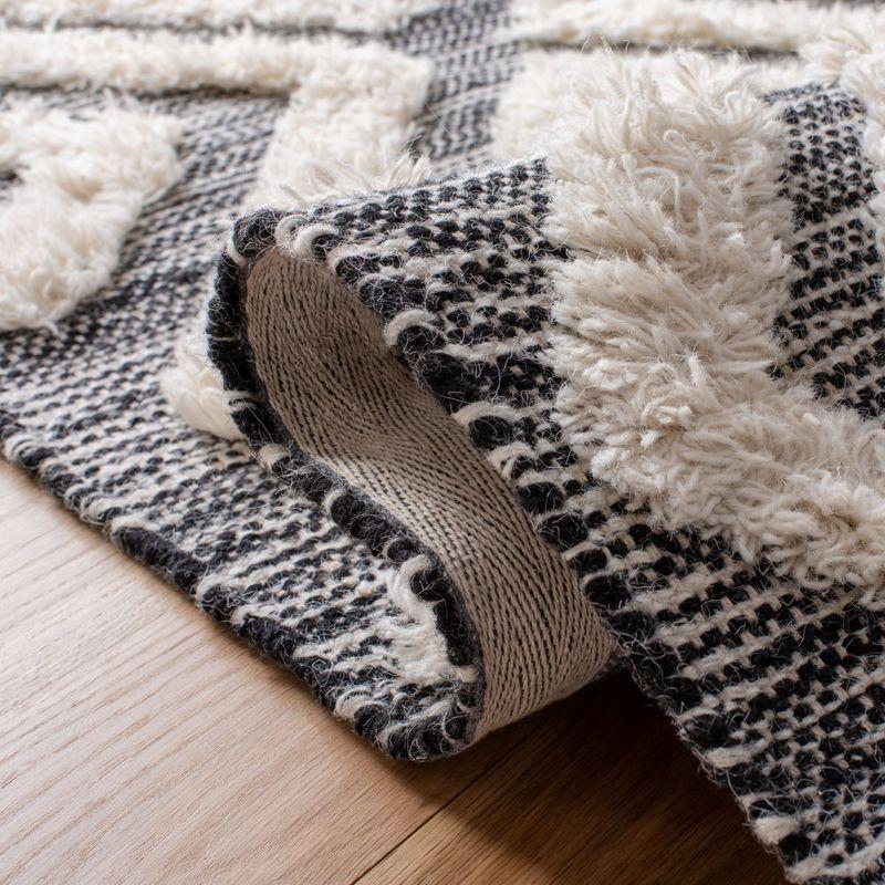 Kenya KNY331 Hand Tufted Area Rug - Black/Ivory - 5'x8' - Safavieh.