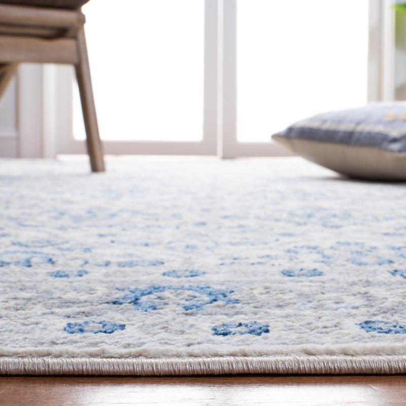 Ivory and Blue Hand-knotted Rectangular Synthetic Rug