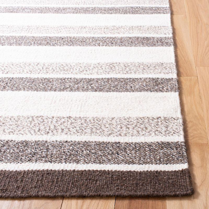 Ivory and Brown Flat Woven Wool Area Rug 4' x 6'