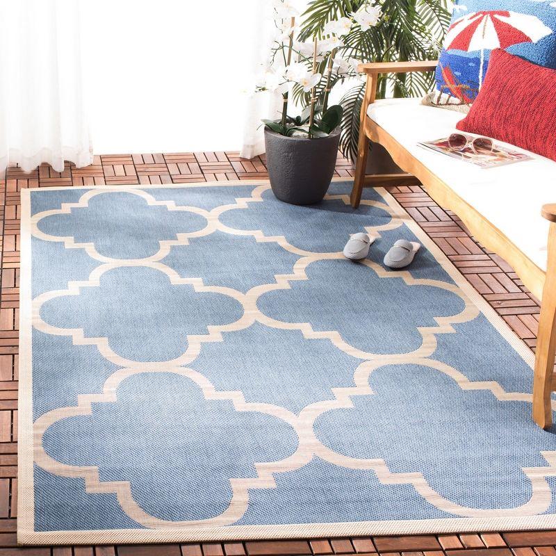 Easy-Care Blue & Beige Synthetic 5' x 7' Indoor/Outdoor Area Rug