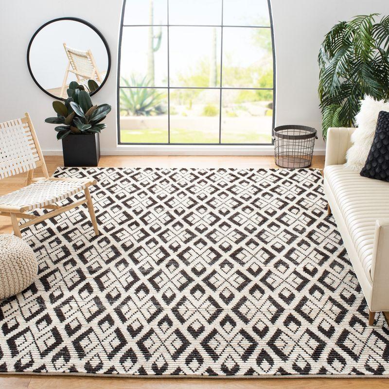 Hand-Knotted Black and Ivory Wool 8' x 10' Area Rug