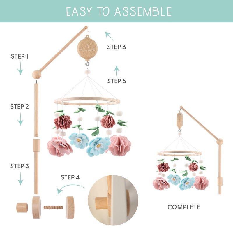 The Peanutshell Deluxe Wooden Crib Mobile Set with Arm, Music Box and Wildflower Baby Mobile, Pink