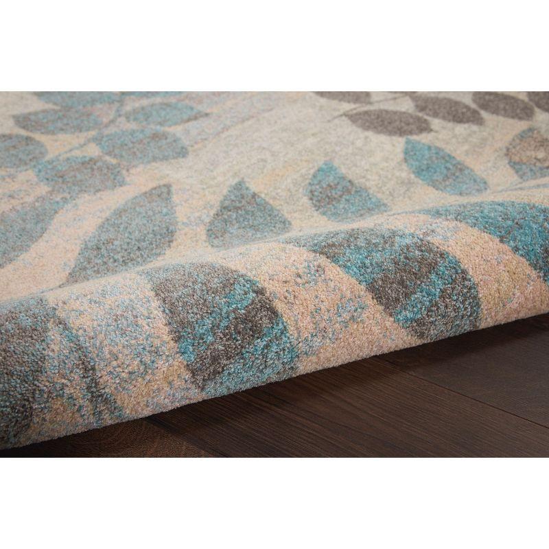 Ivory and Light Blue Floral Synthetic 6' x 9' Area Rug