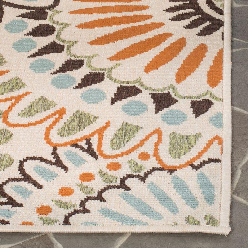 Cream and Chocolate Floral Synthetic Indoor/Outdoor Rug