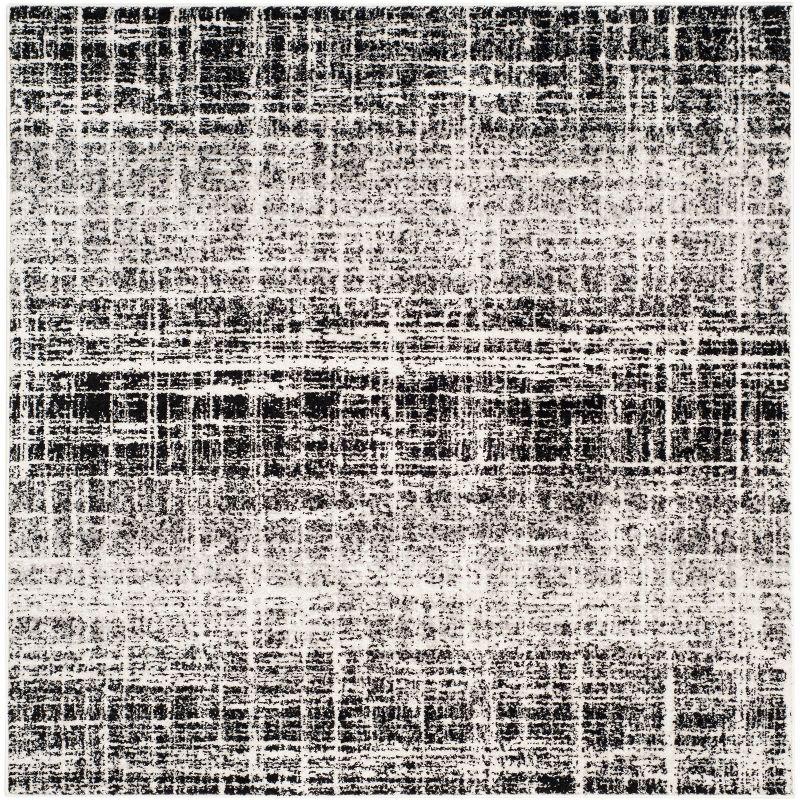 Ivory and Black Abstract Square Synthetic Accent Rug 4'x4'