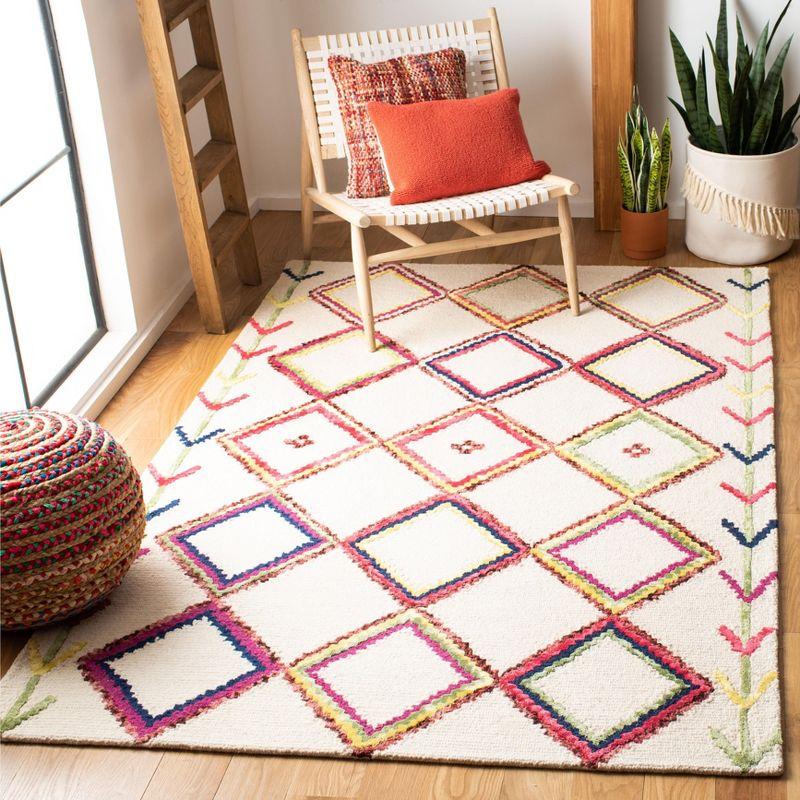 Ivory and Multi Geometric Wool 5' x 8' Area Rug