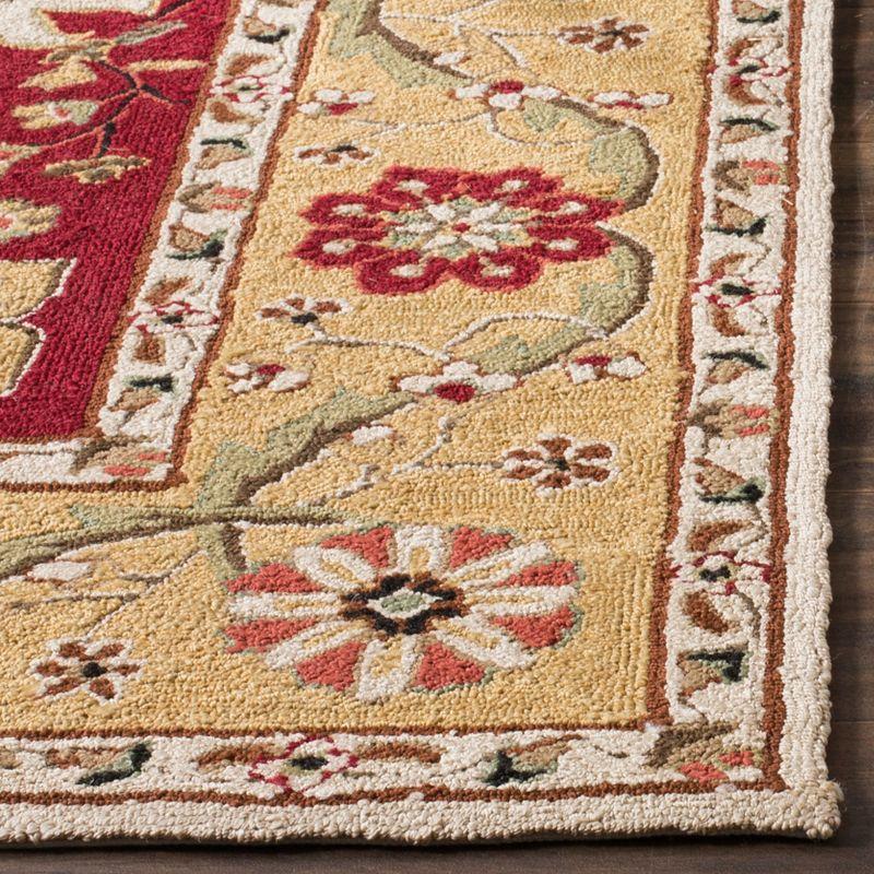 Handmade Cream and Red Synthetic 4' x 6' Area Rug