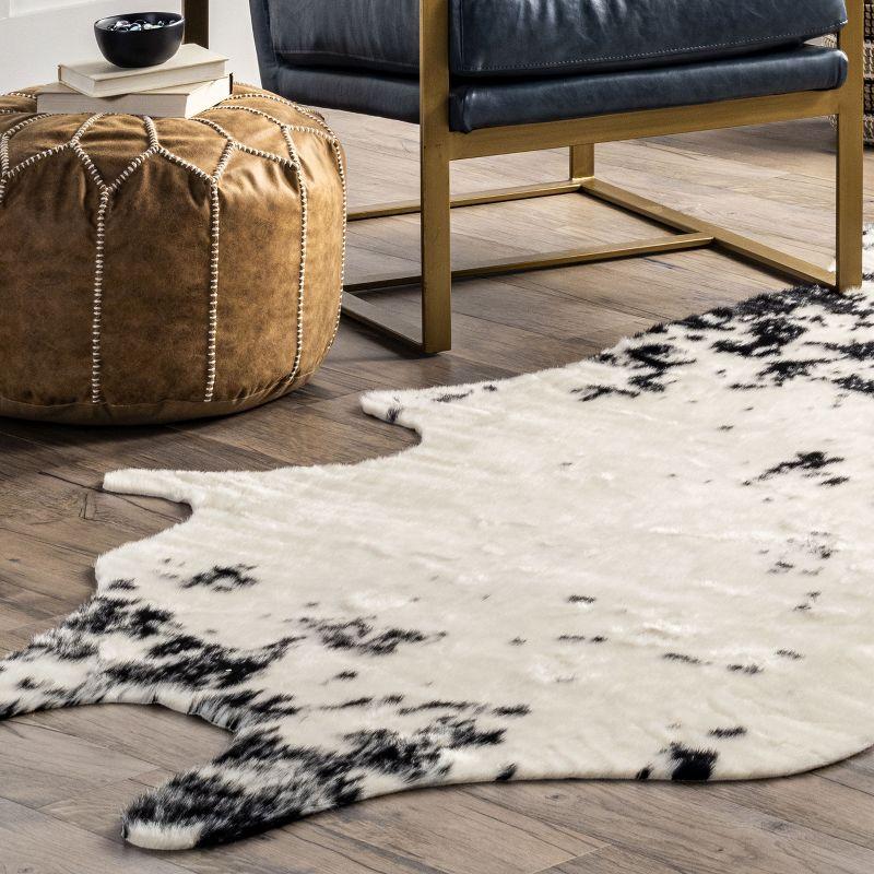 Nuloom Marcia SpinClean Machine Washable Faux Cowhide Area Rug, Shaped 3' 10" x 5', Black