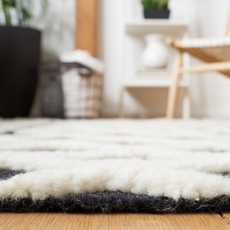 Black and Ivory Wool Hand-Knotted Aztec Runner Rug