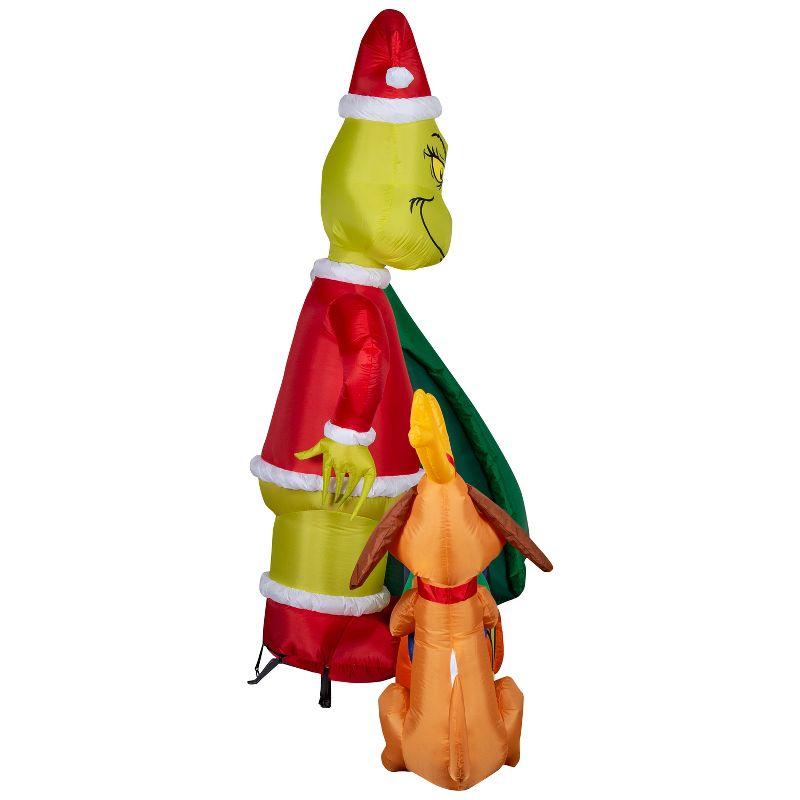 Grinch Christmas Airblown Inflatable Putting Train in Santa Sack Scene Dr. Seuss, 6.5 ft Tall