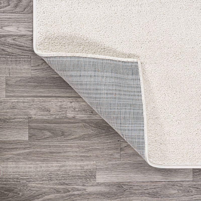 3'x5'Oval  Haze Solid Low-Pile, Cream - JONATHAN Y
