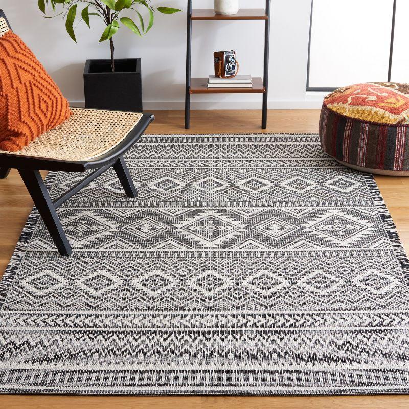 Augustine Black and White 4' x 6' Flat Woven Synthetic Rug