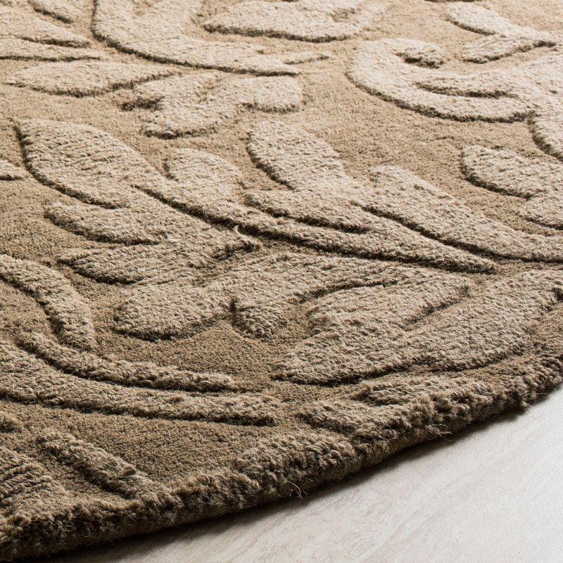 Impressions IM344 Hand Loomed Area Rug - Brown - 5' round - Safavieh.