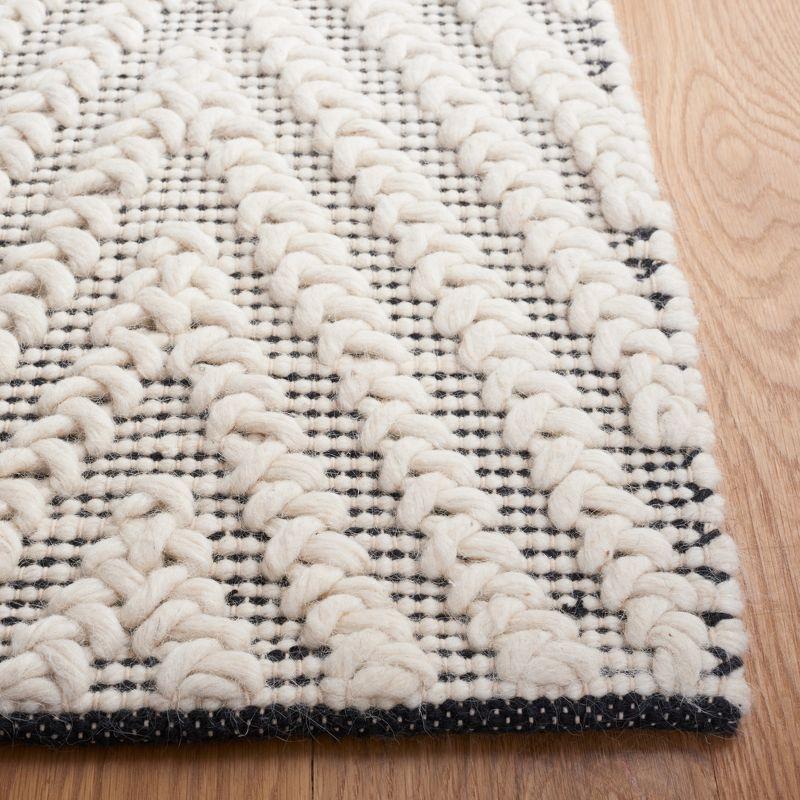 Handmade Black and Ivory Wool Tufted Square Rug