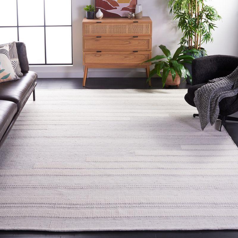 Gray and Ivory 6' x 9' Handmade Wool and Synthetic Rug