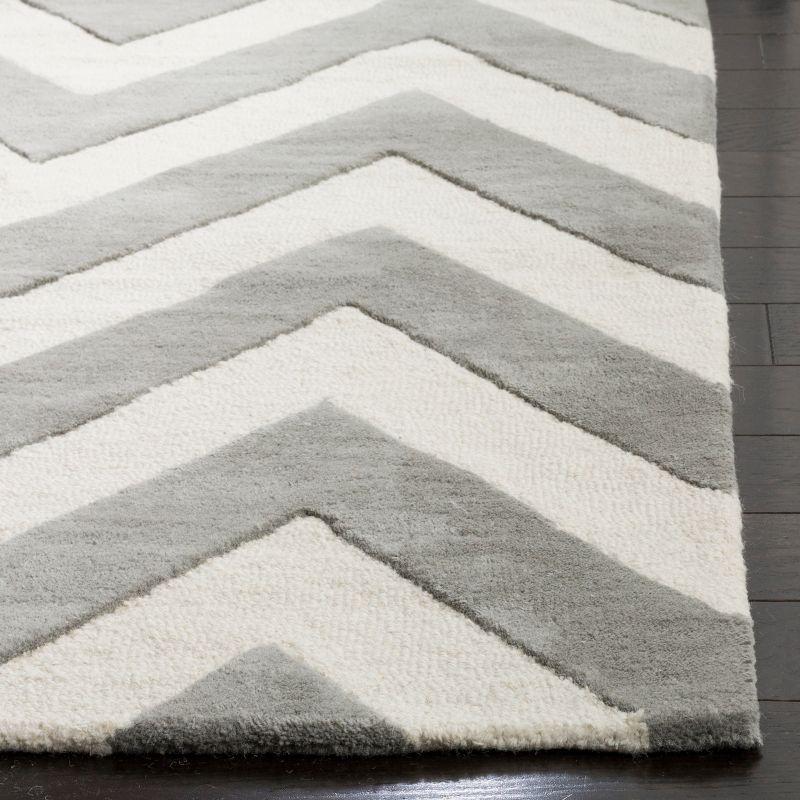Safavieh Kids Basic Chevron SFK921 Hand Tufted Indoor Area Rug - Grey/Ivory - 5'x5' - Safavieh