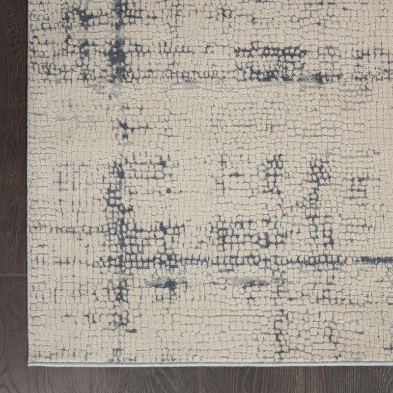 Ivory and Blue Abstract Synthetic 2'2" x 7'6" Area Rug