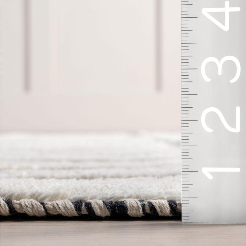 Ebern Designs Merrick Tasseled Cotton and Wool Area Rug