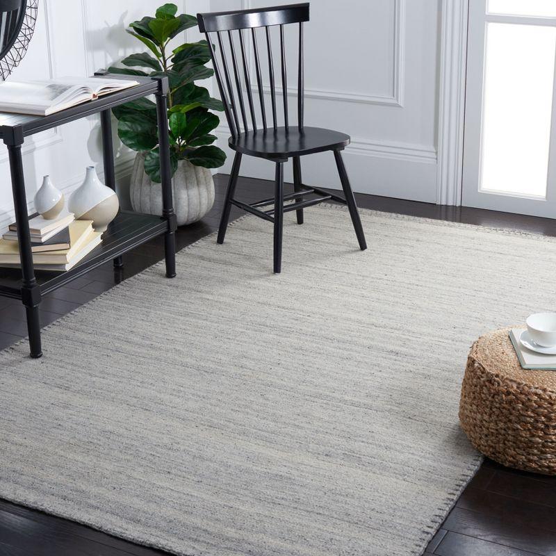 Nomadic Essence Handwoven Gray Wool 5' x 8' Area Rug