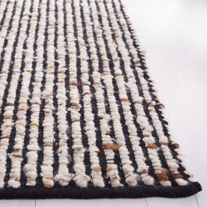 Artisan-Crafted Black Wool 8' x 10' Handwoven Area Rug