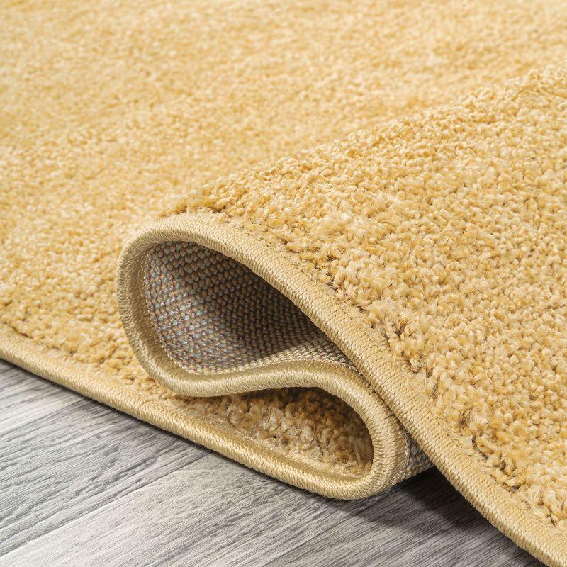 4'x6' Haze Solid Low-Pile Area Rug, Mustard - JONATHAN Y
