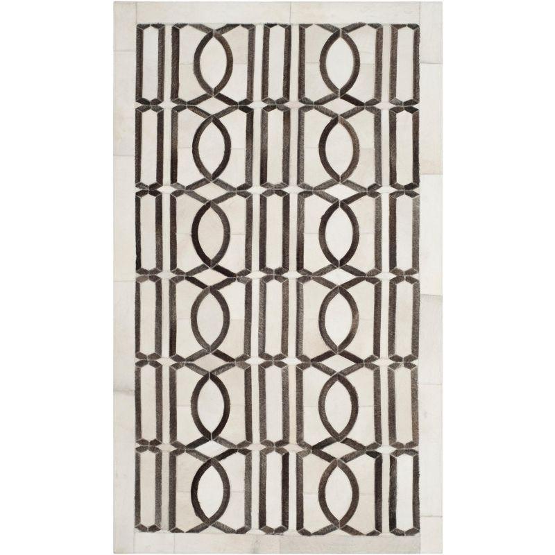 Handmade Ivory Geometric Cowhide Area Rug 47" x 5"