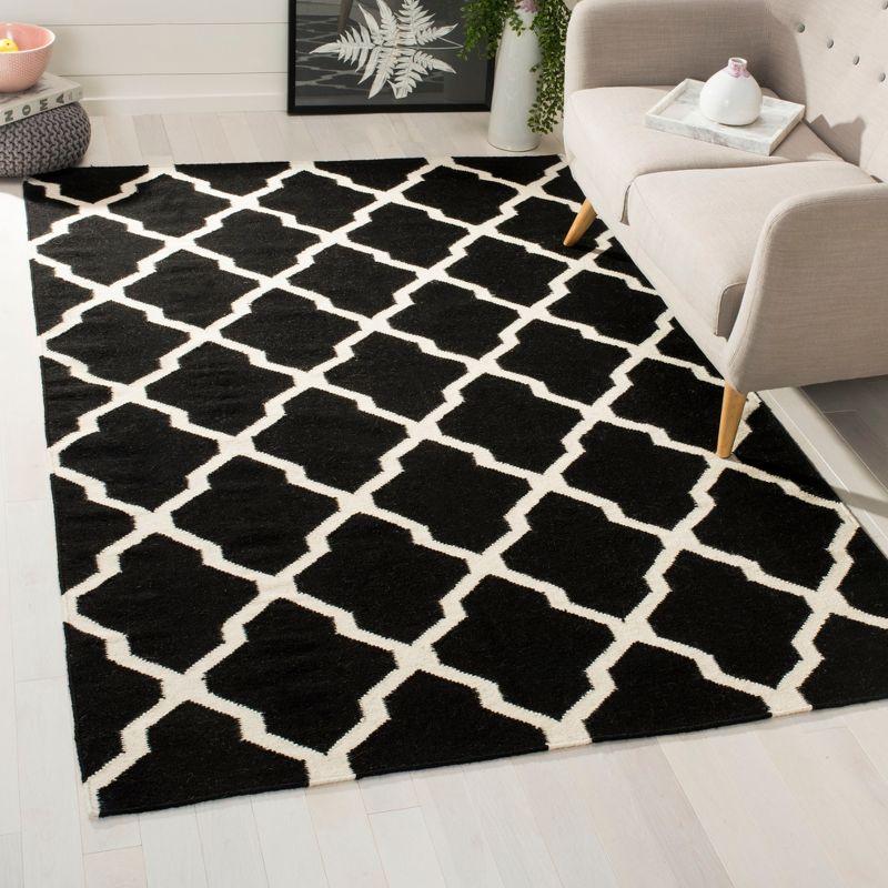 Dhurries DHU634 Hand Woven Area Rug - Black/Ivory - 5'x8' - Safavieh.