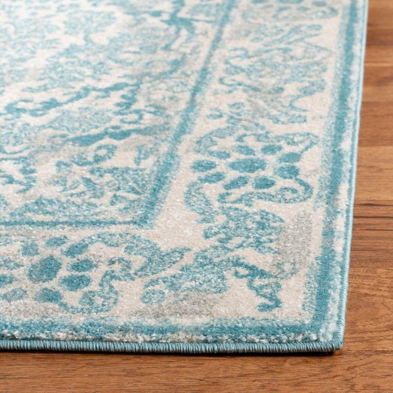 Ivory and Light Blue Rectangular Synthetic Area Rug