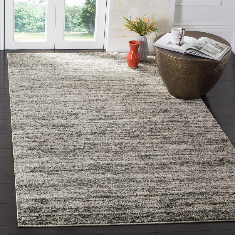 Ivory and Grey Abstract Synthetic Area Rug