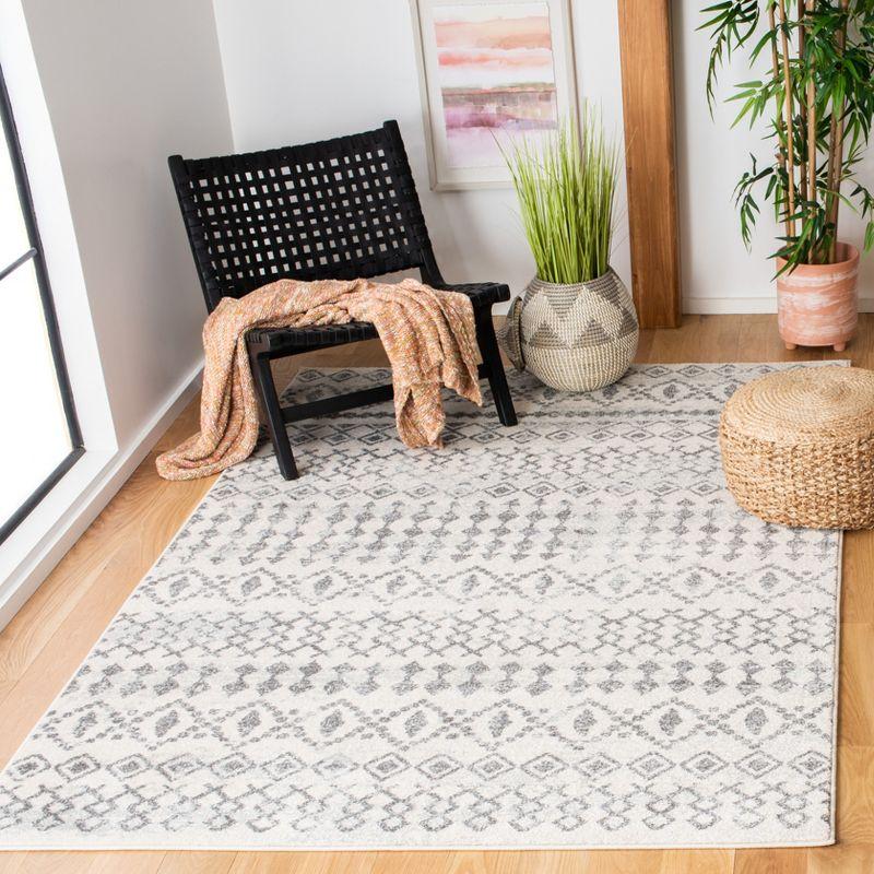 Ivory Geometric 4' x 6' Hand-Knotted Synthetic Area Rug