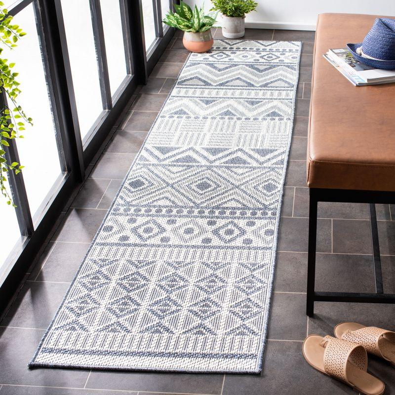 Reversible Blue Geometric Indoor/Outdoor Synthetic Area Rug