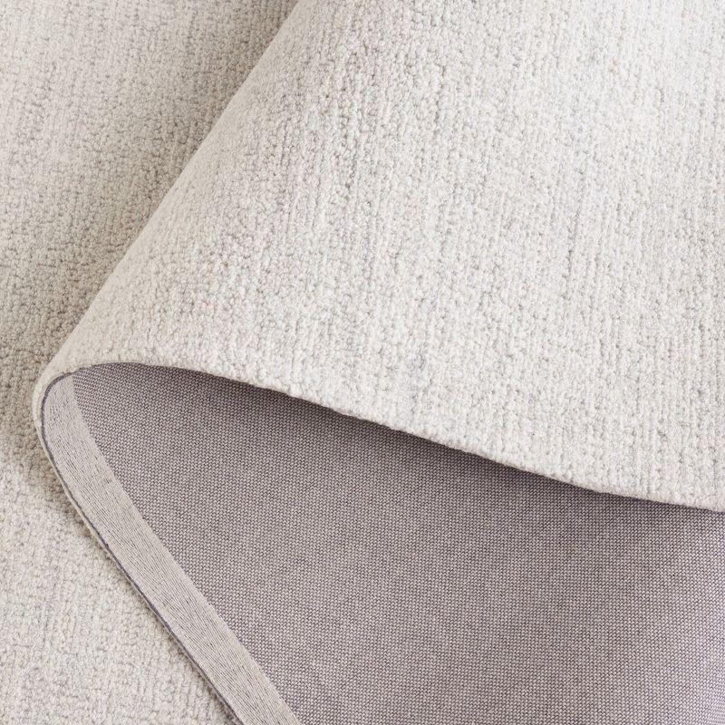 Ebony EBN353 Hand Tufted Area Rug - Light Grey/Ivory - 5'x8' - Safavieh.